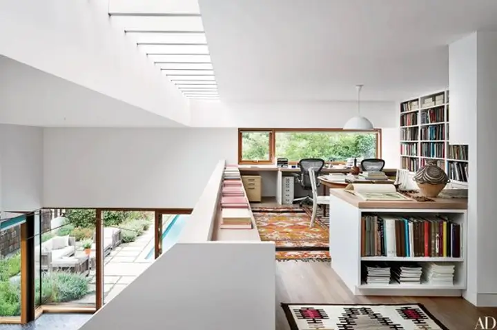 Examples of home office setups in a loft or mezzanine type space, without taking any additional space from the habitable floor space. (Image credit: Architecture Digest)