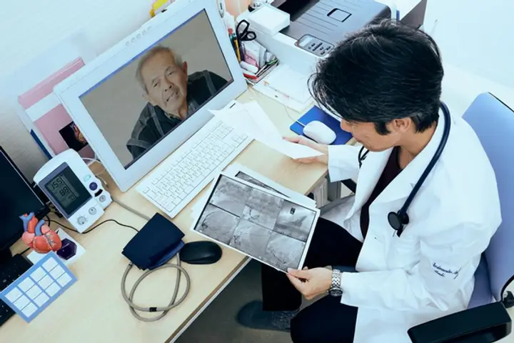 Representation image of a teleconsultation session in progress (Image credit: Forbes Img)